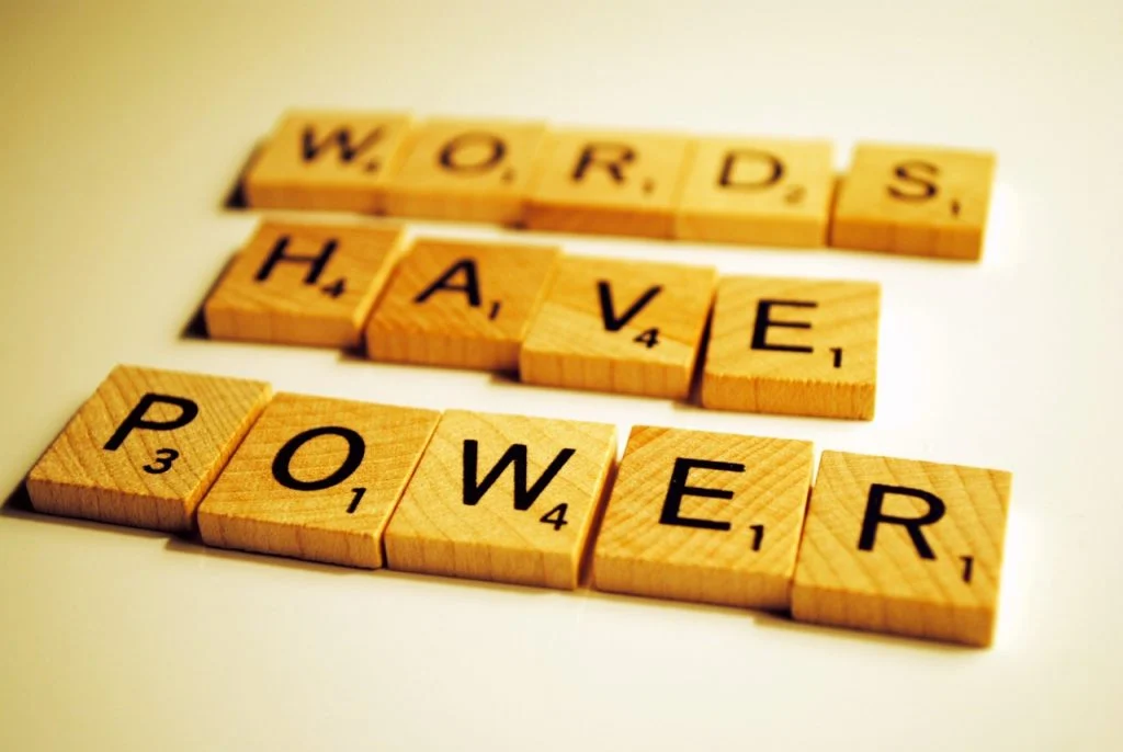 Why is it important to create content with attention-grabbing words?